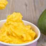 Mango banana heart health frozen yogurt served in white bowl