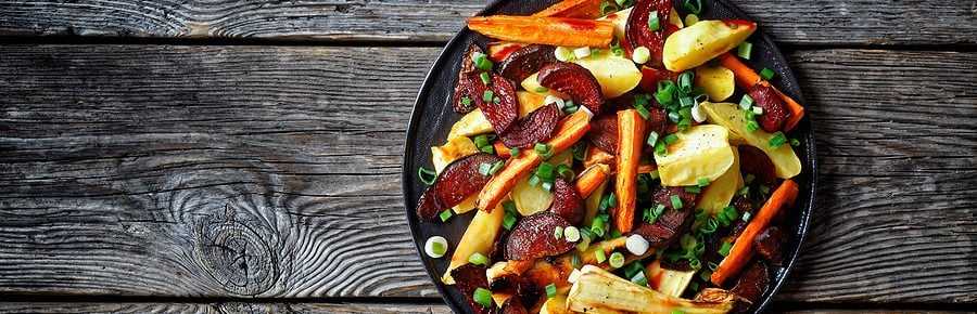 Spicy roasted heart healthy root vegetable wedges with sweet potato carrot and parsnip