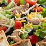 Heart healthy taco salad on wooden background