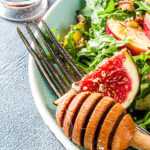 autumn salad on plate with blue background