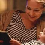 a mom and a child reading a book
