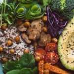 a person holding a bowl of food healthy foods