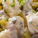 Heart healthy potato salad in a red bowl