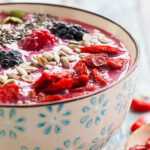 a bowl of fruit and seeds