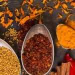 a group of spoons of spices and herbs that lower blood pressure