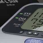 home blood pressure monitor on table.